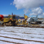 D8 plowing conduit in California